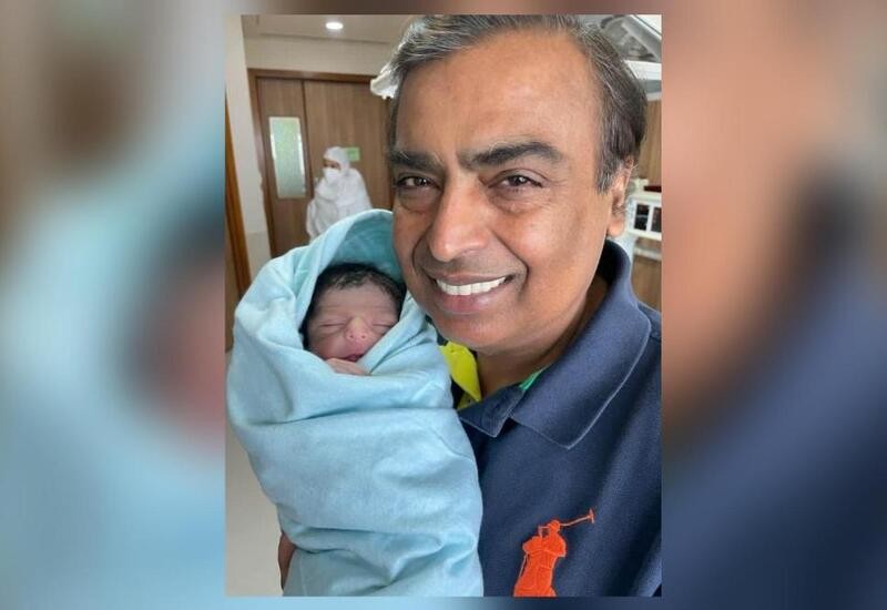 first-picture-of-mukesh-ambani-with-newborn-grandson-surfaces-online